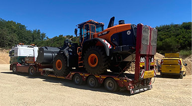 Transport d'engins de chantier chargeuse, mini-chargeuse, pelleteuse, tractopelle, nacelle, bulldozer